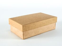 brown cardboard box on white surface