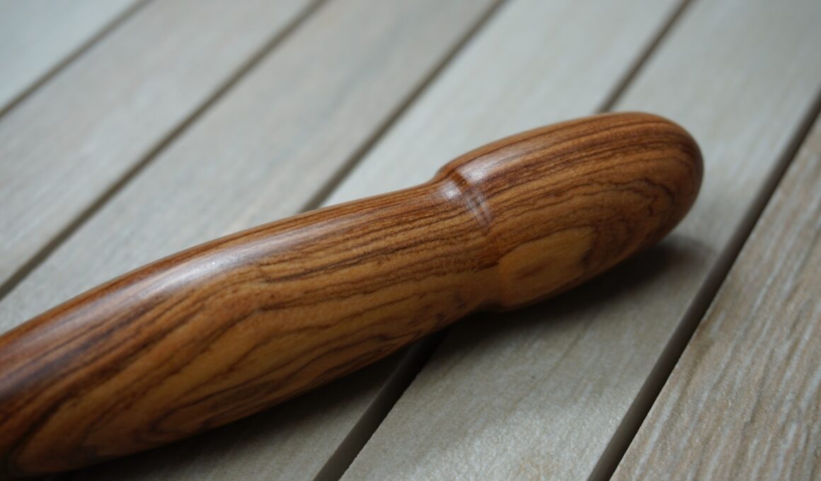 brown wooden handle on white wooden table