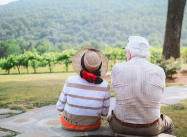 couple sitting on pathway