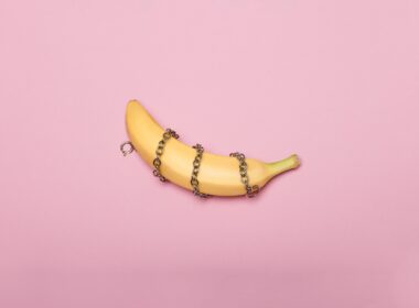 yellow banana on white surface