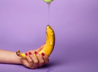 yellow banana fruit on persons hand