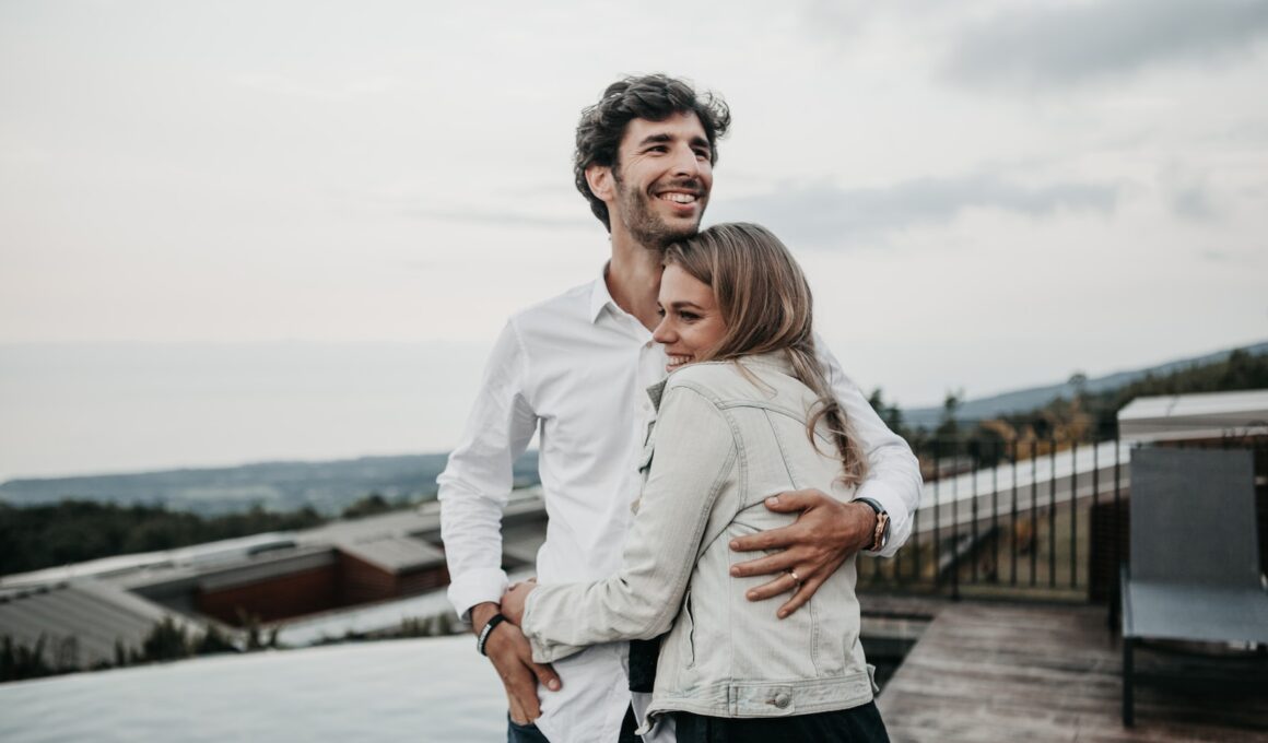 man and woman hugging each other