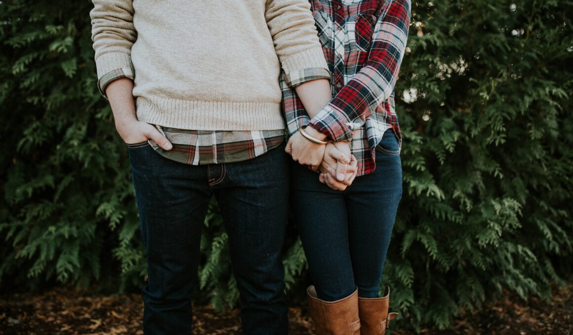 woman holding man hand